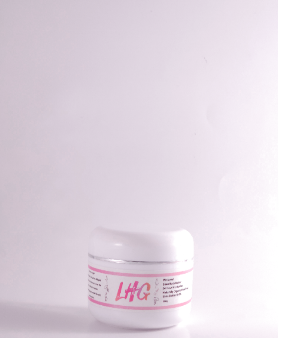 A jar of Whipped Shea Butter with a white lid and label that reads 'LHG'.