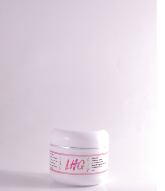 A jar of Whipped Shea Butter with a white lid and label that reads 'LHG'.