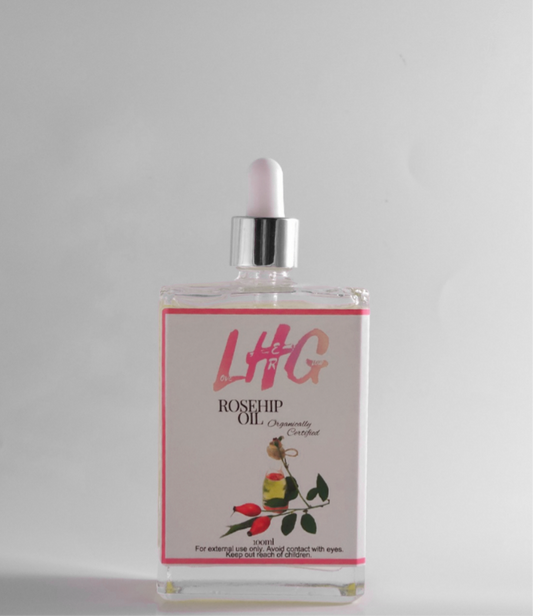A bottle of Rosehip Oil with a dropper, featuring a white label with pink and green text, and an illustration of a rose. 

https://www.loveherglow.com/products/rosehip-oil