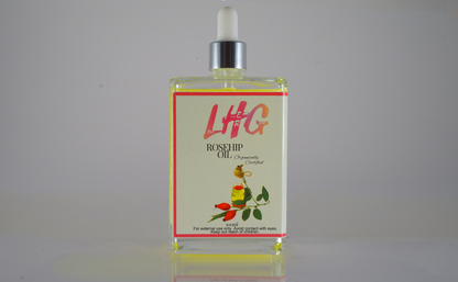 LHG rosehip oil bottle with dropper on a gray background