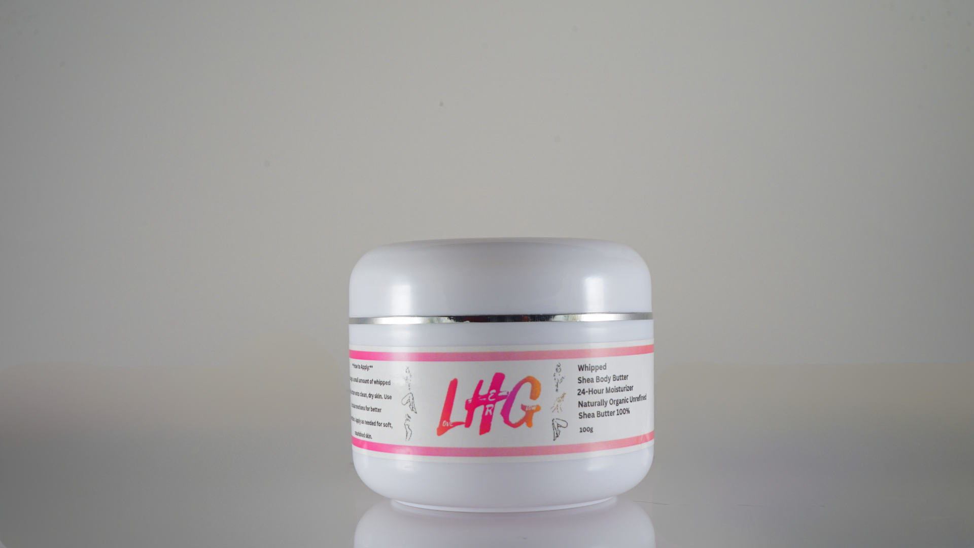 Jar of cream with 'LHG' branding on a gray background